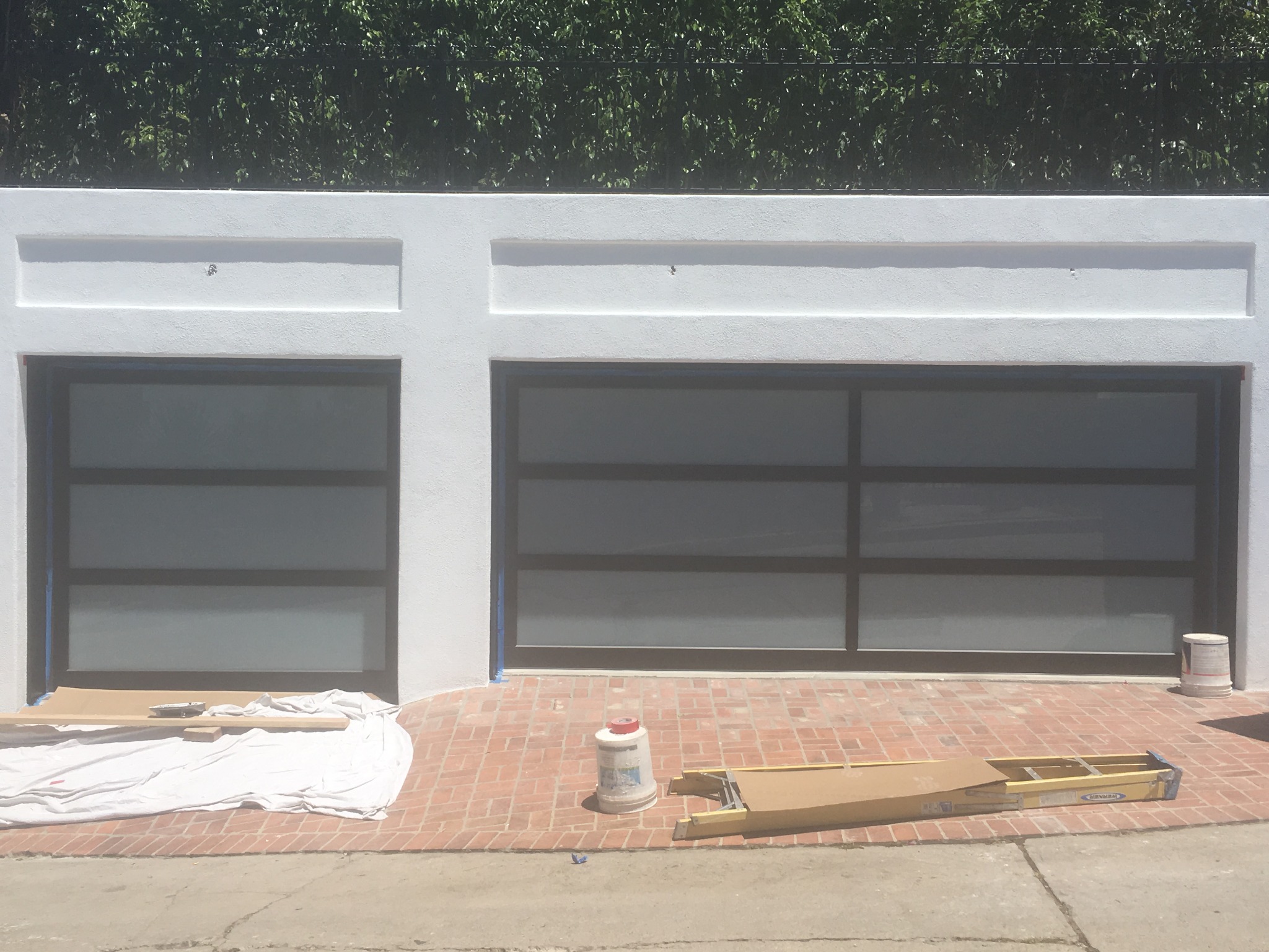 Black framed glass garage doors
