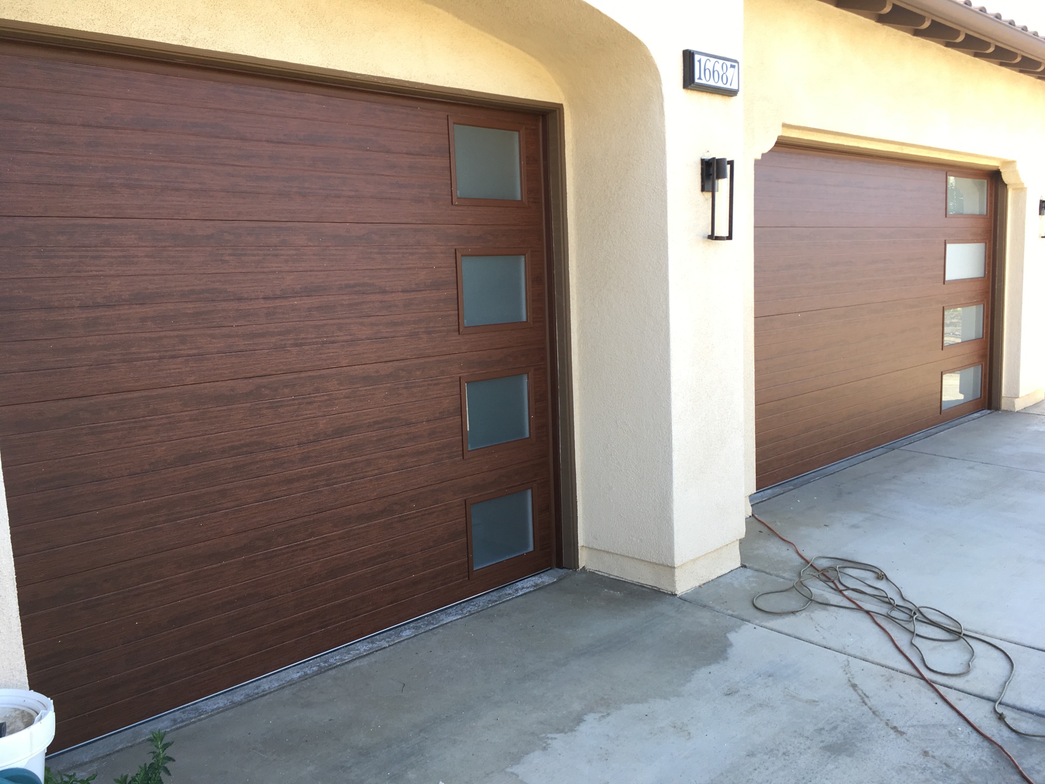 Wood-look modern garage door installation